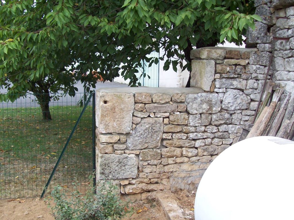 10 remontage d'un mur en pierre